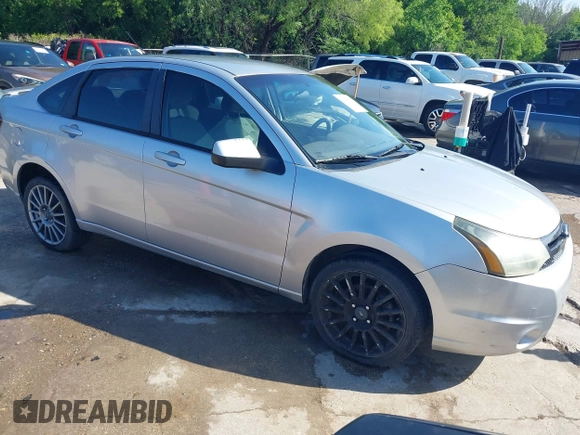2010 Ford Focus SES with VIN 1FAHP3GN5AW115229, listed as a IAAI auction lot 42098503 with 156,127 mi miles. Bid and sale history available at carsss.com. Image 1.