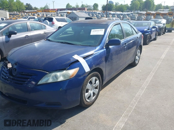 2009 Toyota Camry with VIN 4T1BE46K59U401572, listed as a IAAI auction lot 42059793 with 215,238 mi miles. Bid and sale history available at carsss.com. Image 2.