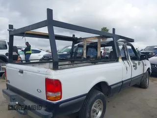 1994 Ford Ranger Splash z VIN 1FTCR14U5RPC39232, wystawiony jako IAAI lot #42090413 z przebiegiem Nie podano mil oraz . Historia ofert i sprzedaży dostępna na DreamBid. Obrazek 4.