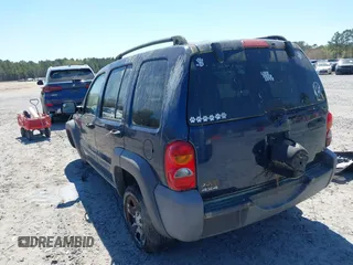 2004 Jeep Liberty Sport with VIN 1J4GL48K44W303606, listed as a IAAI auction lot 41895990 with 145,765 mi miles. Bid and sale history available at carsss.com. Image 3.