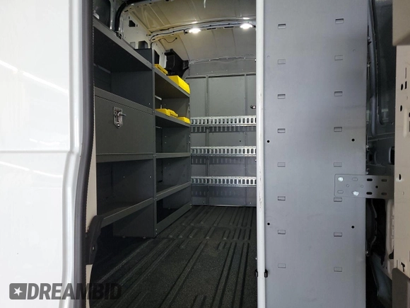 2023 Ford Transit Cargo with VIN 1FTBR1X86PKB99022, listed as a IAAI auction lot 42841650 with 14,234 mi miles and . Bid and sale history available at DreamBid. Image 2.