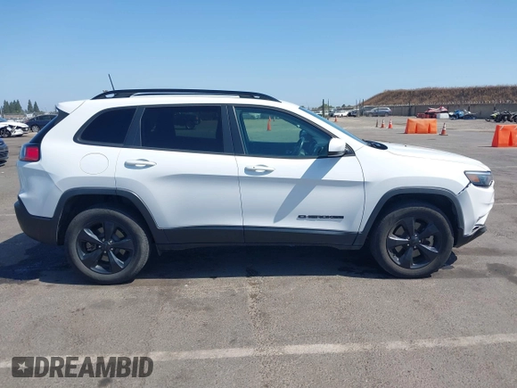 2021 Jeep Cherokee Latitude Plus z VIN 1C4PJMLB8MD116593, wystawiony jako IAAI lot #42484098 z przebiegiem 74 288 mil mil oraz . Historia ofert i sprzedaży dostępna na DreamBid. Obrazek 14.