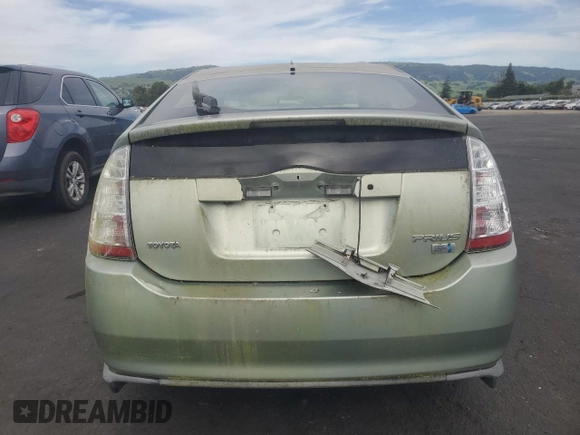 2006 Toyota Prius z VIN JTDKB20U667513920, wystawiony jako Copart lot #52853405 z przebiegiem 186 137 mil mil oraz Szkoda całkowita • Salvage title. Historia ofert i sprzedaży dostępna na DreamBid. Obrazek 6.