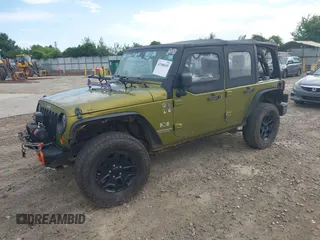 2007 Jeep Wrangler Unlimited X with VIN 1J4GA39177L164566, listed as a IAAI auction lot 42588655 with 50,915 mi miles and . Bid and sale history available at DreamBid. Image 2.