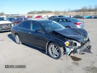 2013 Chevrolet Impala LTZ with VIN 2G1WC5E3XD1237776, listed as a IAAI auction lot 42023033 with 143,279 mi miles and . Bid and sale history available at DreamBid. Image 1.