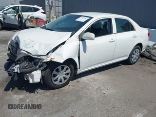 2009 Toyota Corolla with VIN JTDBL40E599087258, listed as a IAAI auction lot 41985357 with 168,115 mi miles. Bid and sale history available at carsss.com. Image 2.