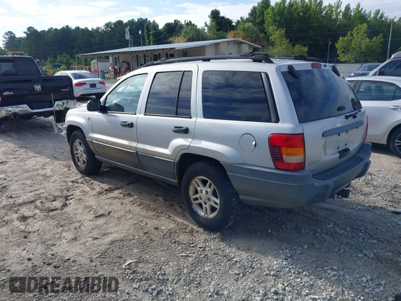 2004 Jeep Grand Cherokee Laredo z VIN 1J4GW48S94C372798, wystawiony jako IAAI lot #42812536 z przebiegiem 113 960 mil mil oraz . Historia ofert i sprzedaży dostępna na DreamBid. Obrazek 3.