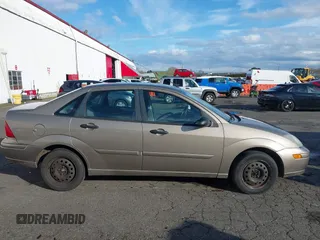 2004 Ford Focus SE with VIN 1FAFP34354W167961, listed as a IAAI auction lot 41545304 with 128,560 mi miles and . Bid and sale history available at DreamBid. Image 13.