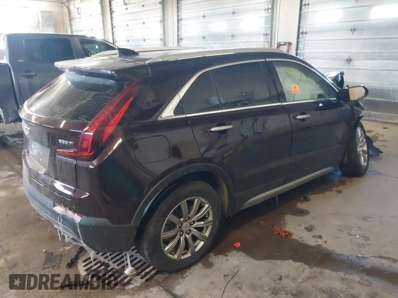 2020 Cadillac XT4 AWD Premium Luxury with VIN 1GYFZDR48LF121111, listed as a IAAI auction lot 41533664 with Not Provided miles. Bid and sale history available at carsss.com. Image 4.