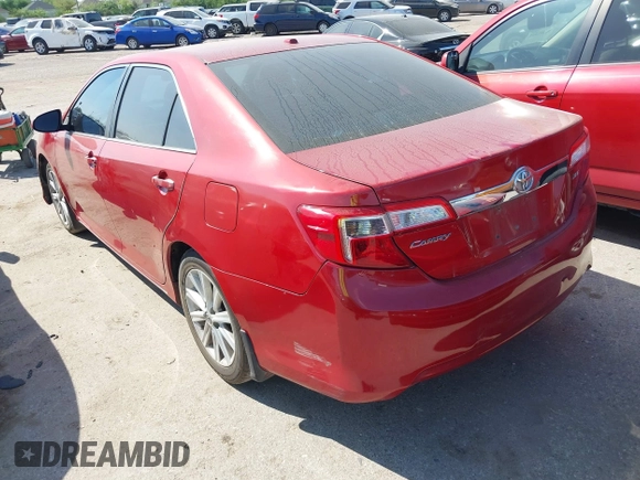2014 Toyota Camry SE with VIN 4T1BK1FK8EU547143, listed as a IAAI auction lot 41876192 with 209,535 mi miles. Bid and sale history available at carsss.com. Image 3.