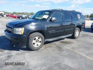 2011 Chevrolet Suburban LS with VIN 1GNSCHE04BR284777, listed as a IAAI auction lot 41291991 with 285,187 mi miles. Bid and sale history available at carsss.com. Image 2.