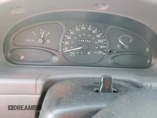 1998 Ford Escort LX with VIN 1FAFP10P2WW303270, listed as a Copart auction lot 87588365 with 142,743 mi miles and Salvage Title. Bid and sale history available at carsss.com. Image 9.