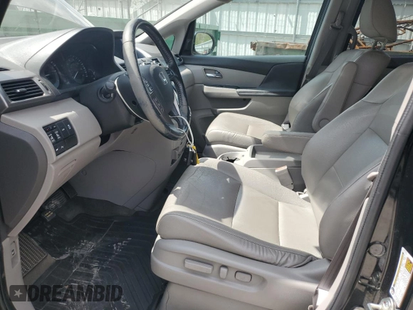 2016 Honda Odyssey Touring Elite with VIN 5FNRL5H97GB038917, listed as a Copart auction lot 54479375 with 165,432 mi miles and Salvage Title. Bid and sale history available at DreamBid. Image 7.