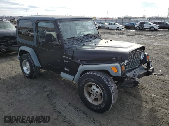 2002 Jeep Wrangler Sport with VIN 1J4FA49S32P758082, listed as a Copart auction lot 80692073 with 148,784 mi miles and Salvage Title. Bid and sale history available at carsss.com. Image 4.