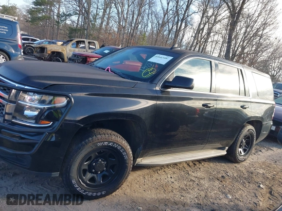 2015 Chevrolet Tahoe Commercial z VIN 1GNLC2EC4FR535329, wystawiony jako IAAI lot #41643486 z przebiegiem 185 326 mil mil oraz . Historia ofert i sprzedaży dostępna na DreamBid. Obrazek 14.