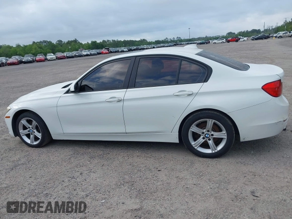 2015 BMW 3 Series 328i with VIN WBA3A5C50FF608327, listed as a IAAI auction lot 42136156 with 213,945 mi miles. Bid and sale history available at carsss.com. Image 14.