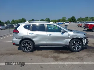 2017 Nissan Rogue SV with VIN 5N1AT2MV0HC832876, listed as a IAAI auction lot 42389131 with 73,856 mi miles and . Bid and sale history available at DreamBid. Image 14.