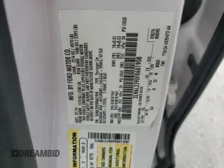 2015 Lincoln MKZ z VIN 3LN6L2J90FR601908, wystawiony jako Copart lot #55516355 z przebiegiem 127 487 mil mil oraz Szkoda całkowita • Salvage title. Historia ofert i sprzedaży dostępna na DreamBid. Obrazek 13.