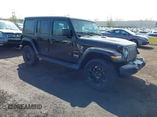 2022 Jeep Wrangler Unlimited Sahara with VIN 1C4JJXP61NW213726, listed as a IAAI auction lot 42052834 with 44,889 mi miles and . Bid and sale history available at DreamBid. Image 1.