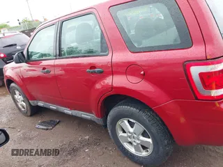 2009 Ford Escape XLS with VIN 1FMCU92729KB54674, listed as a IAAI auction lot 42170275 with 108,509 mi miles and . Bid and sale history available at DreamBid. Image 14.