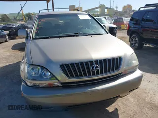 1999 Lexus RX 300 with VIN JT6HF10U6X0092078, listed as a IAAI auction lot 41988259 with 144,148 mi miles and . Bid and sale history available at DreamBid. Image 12.