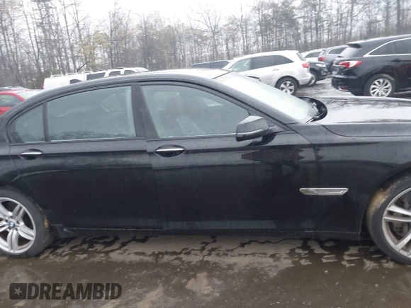 2013 BMW 7 Series 750Li с VIN WBAYE8C53DD133504, выставлен на аукционе IAAI как лот 42005346 с пробегом 142 894 миль миль и . История ставок и продаж доступна на DreamBid. Изображение 13.