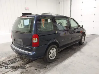 2001 Chevrolet Venture Value 1SV Pkg with VIN 1GNDU23E21D205829, listed as a IAAI auction lot 41592907 with 116,223 mi miles. Bid and sale history available at carsss.com. Image 4.