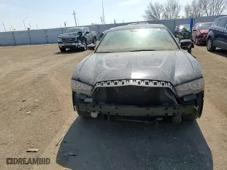 2013 Dodge Charger SE with VIN 2C3CDXBG7DH689366, listed as a Copart auction lot 50553475 with 118,664 mi miles and Salvage Title. Bid and sale history available at carsss.com. Image 10.