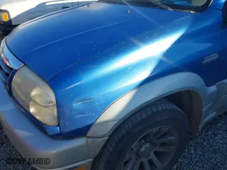 2005 Suzuki Grand Vitara LX with VIN JS3TD62V454200796, listed as a IAAI auction lot 41414899 with 228,069 mi miles. Bid and sale history available at carsss.com. Image 6.