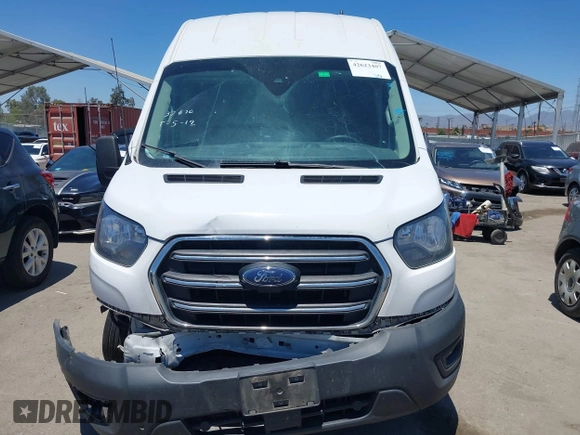 2020 Ford Transit Cargo z VIN 1FTBW3X89LKB72069, wystawiony jako IAAI lot #42623407 z przebiegiem 454 279 mil mil oraz . Historia ofert i sprzedaży dostępna na DreamBid. Obrazek 13.