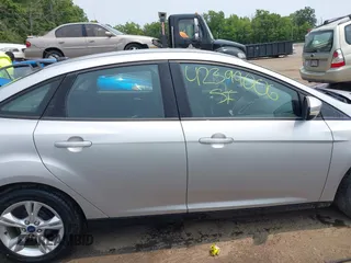 2013 Ford Focus SE with VIN 1FADP3F28DL208516, listed as a IAAI auction lot 42399006 with 103,869 mi miles and . Bid and sale history available at DreamBid. Image 13.