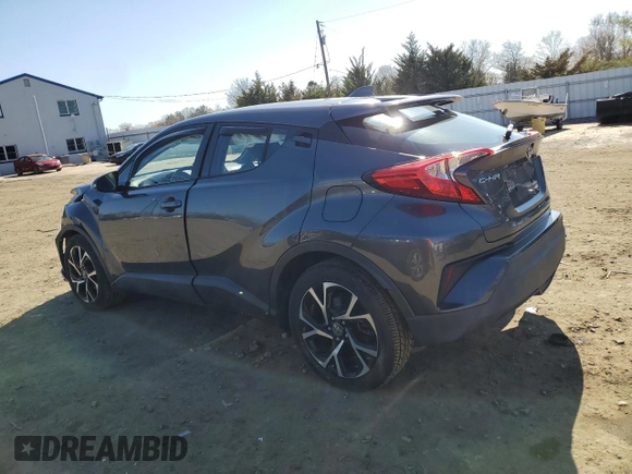 2019 Toyota C-HR XLE z VIN NMTKHMBX4KR084471, wystawiony jako Copart lot #52575985 z przebiegiem 54 578 mil mil oraz Szkoda całkowita • Salvage title. Historia ofert i sprzedaży dostępna na DreamBid. Obrazek 2.