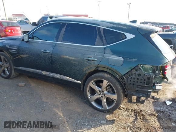 2021 Genesis GV80 with VIN KMUHCESCXMU031136, listed as a IAAI auction lot 41297818 with 31,890 mi miles and . Bid and sale history available at DreamBid. Image 3.