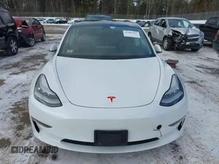 2020 Tesla Model 3 Standard Range Plus with VIN 5YJ3E1EA7LF742973, listed as a IAAI auction lot 41409285 with 48,993 mi miles and . Bid and sale history available at DreamBid. Image 12.