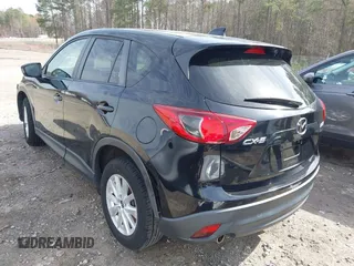 2014 Mazda CX-5 Touring with VIN JM3KE2CY9E0333951, listed as a IAAI auction lot 41825345 with 124,684 mi miles. Bid and sale history available at carsss.com. Image 3.