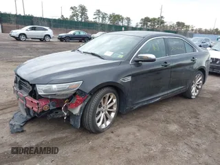 2014 Ford Taurus Limited with VIN 1FAHP2F87EG170805, listed as a IAAI auction lot 41726237 with Not Provided miles. Bid and sale history available at carsss.com. Image 2.