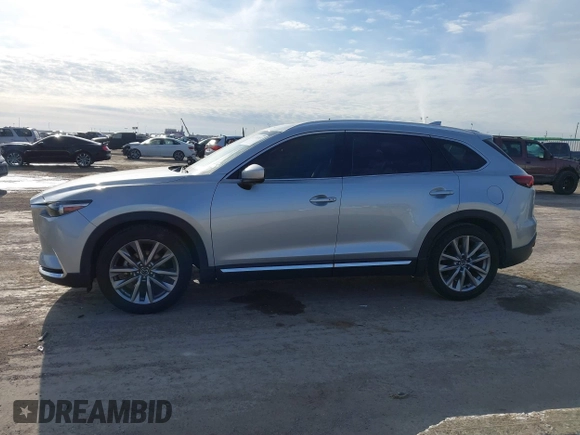 2020 Mazda CX-9 Grand Touring z VIN JM3TCADY7L0416696, wystawiony jako IAAI lot #41310183 z przebiegiem 105 754 mil mil oraz . Historia ofert i sprzedaży dostępna na DreamBid. Obrazek 14.