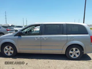 2013 Dodge Grand Caravan SE with VIN 2C4RDGBG0DR702913, listed as a IAAI auction lot 42007786 with 163,981 mi miles and . Bid and sale history available at DreamBid. Image 14.