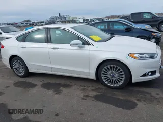 2015 Ford Fusion Titanium with VIN 3FA6P0D96FR192778, listed as a IAAI auction lot 41643030 with 141,805 mi miles. Bid and sale history available at carsss.com. Image 14.