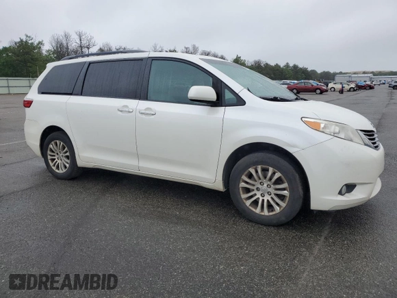 2016 Toyota Sienna XLE with VIN 5TDYK3DC8GS748036, listed as a Copart auction lot 60047235 with 147,203 mi miles and Salvage title. Bid and sale history available at DreamBid. Image 4.
