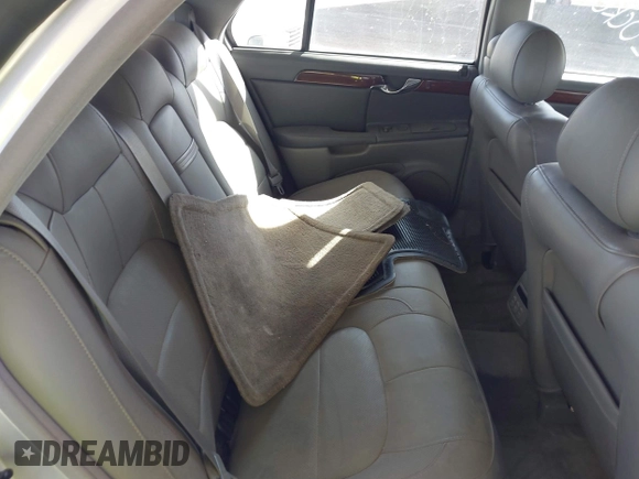 2003 Cadillac DeVille DTS z VIN 1G6KF57923U260229, wystawiony jako IAAI lot #41415468 z przebiegiem 58 012 mil mil oraz . Historia ofert i sprzedaży dostępna na DreamBid. Obrazek 8.
