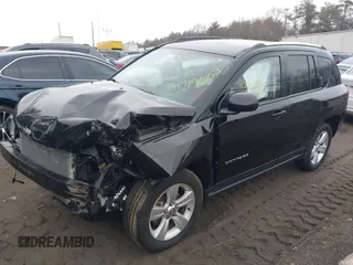 2015 Jeep Compass Latitude with VIN 1C4NJDEB3FD105704, listed as a IAAI auction lot 41719603 with 106,904 mi miles. Bid and sale history available at carsss.com. Image 2.