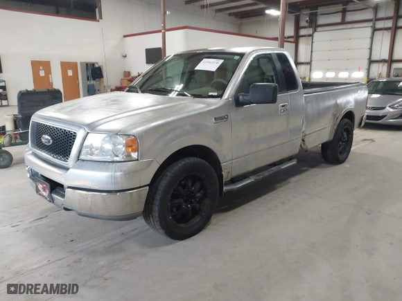 2005 Ford F-150 XL with VIN 1FTRF12W15NA18935, listed as a IAAI auction lot 41942570 with 152,708 mi miles. Bid and sale history available at carsss.com. Image 2.