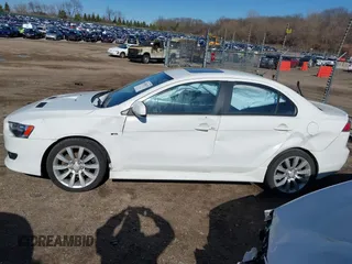 2011 Mitsubishi Lancer GTS with VIN JA32U8FW3BU030708, listed as a IAAI auction lot 41826170 with 213,889 mi miles. Bid and sale history available at carsss.com. Image 14.