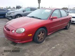 1997 Ford Taurus z VIN 1FALP54N7VA137035, wystawiony jako IAAI lot #41778551 z przebiegiem 137 025 mil mil oraz . Historia ofert i sprzedaży dostępna na DreamBid. Obrazek 2.
