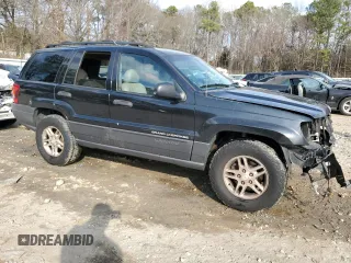 2003 Jeep Grand Cherokee Laredo with VIN 1J4GX48S43C609354, listed as a Copart auction lot 43924595 with 212,949 mi miles and Salvage Title. Bid and sale history available at carsss.com. Image 4.