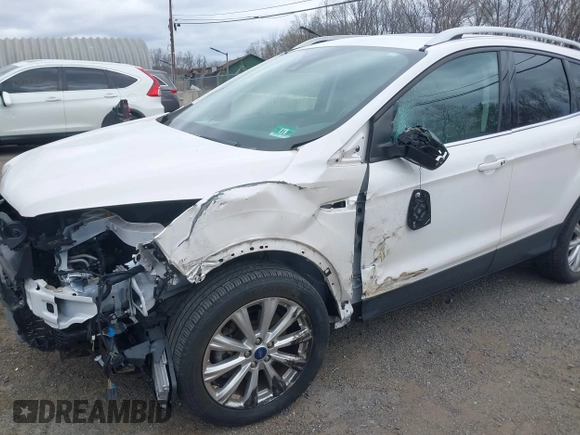 2018 Ford Escape Titanium with VIN 1FMCU9J90JUD53380, listed as a IAAI auction lot 42042802 with 30,371 mi miles and . Bid and sale history available at DreamBid. Image 18.