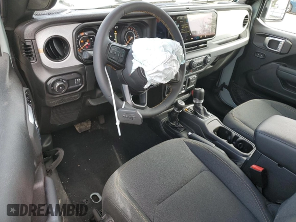 2024 Jeep Wrangler Sport S with VIN 1C4PJXAG2RW335190, listed as a Copart auction lot 51767465 with 2,717 mi miles and Salvage title. Bid and sale history available at DreamBid. Image 8.