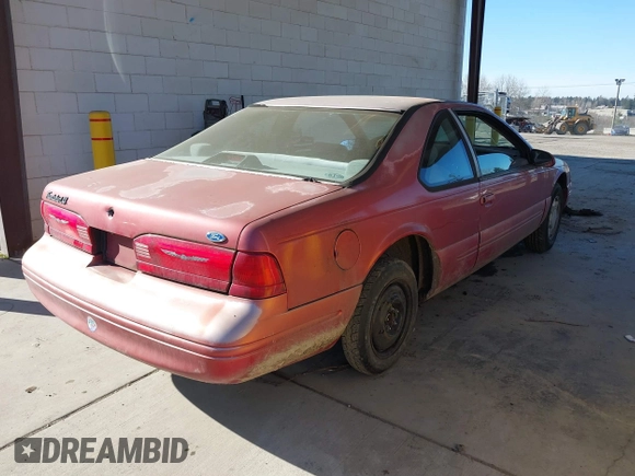 1997 Ford Thunderbird LX with VIN 1FALP6247VH138208, listed as a IAAI auction lot 41562980 with 135,204 mi miles and . Bid and sale history available at DreamBid. Image 4.
