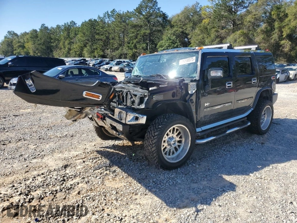 2006 Hummer H2 z VIN 5GRGN23U06H104393, wystawiony jako Copart lot #46208975 z przebiegiem 168 053 mil mil oraz Szkoda całkowita • Salvage title. Historia ofert i sprzedaży dostępna na DreamBid. Obrazek 1.
